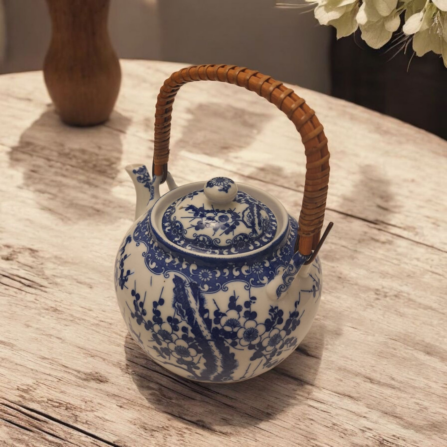 Close-up of hand-painted ceramic details on the Tilso teapot, traditional Japanese design